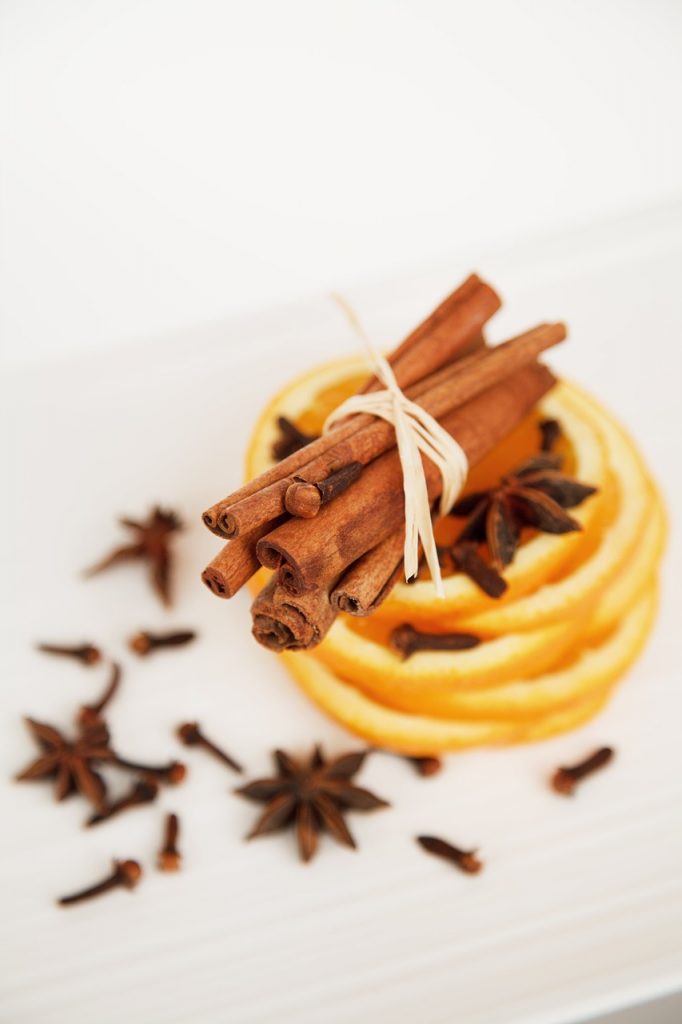 cinnamon sticks, star anise, orange slices